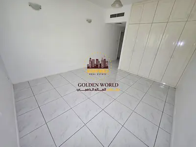 2BR apartment in Al Majaz 2 with 2 master bedrooms, 3 bathrooms, built-in wardrobes, spacious layout, and an open view. Ideal for families.