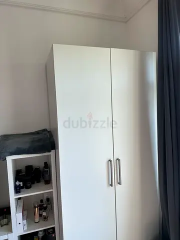 White built-in wardrobe / cupboard with shelves, good condition