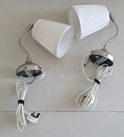 Pair of IKEA wall-mounted reading lamps with shades