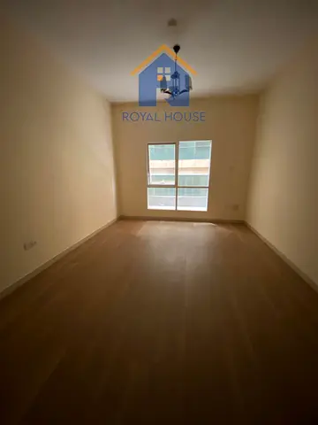 For sale: two rooms and a living room in Corniche Al Majaz Tower, front row on Khalid Lake, in a pr