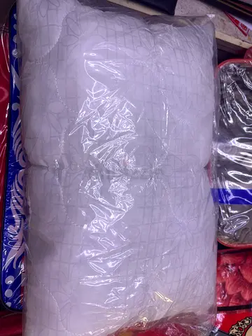 Comfortable Quilted Bed Pillow - New, Packaged siza 35x50