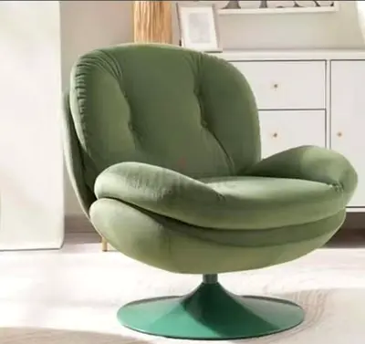 Cozy green tufted accent chair