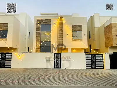الحليو 2 – عجمان | فرصة سكنية مميزة موقع استراتيجي بجوار كافة الخدمات، فيلا فاخرة تتكون من 7 غرف ماستر، طابقين + روف بتشطيبات راقية، مع سعر شامل ال
