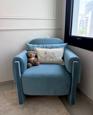 Light Blue Velvet Armchair - Single Seater Rocking Chair. Was custom made for our son’s nursery.