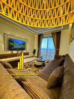 Luxury apartment for monthly rent, two bedrooms and a hall with a sea view, fully furnished with hig
