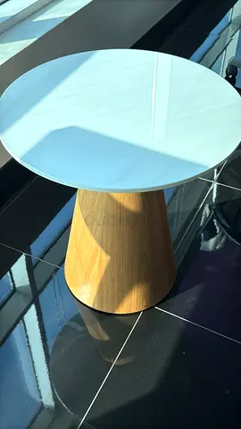 Small round side table with wood base and white top