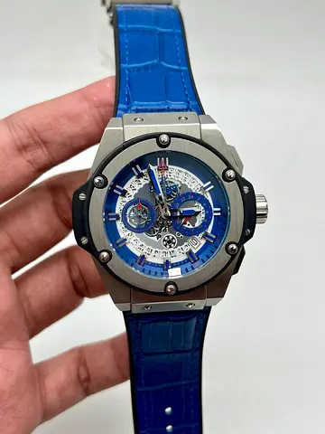 Blue skeleton dial men's wristwatch with blue leather strap