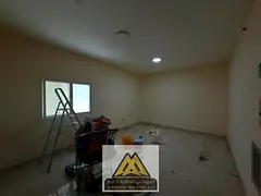 A spacious studio for annual rent in Al Nakhil 1, Ajman, featuring central air conditioning and loca