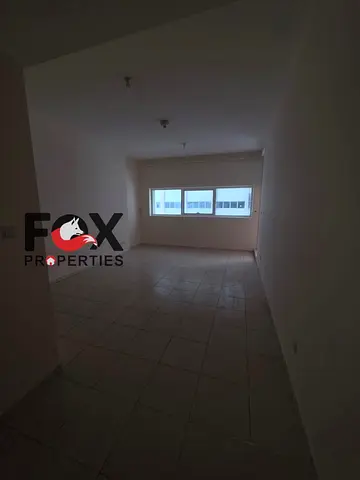 2BR + Hall for annual rent in Ajman One Towers. Prime location with spacious layout, ideal for families. Annual rent AED 44,000, payable in 4 installm