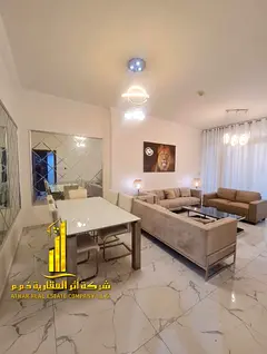 Luxury 3-bedroom apartment with a living room and a balcony offering a sea view—available for mont