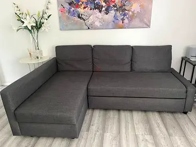 Grey L-shaped Sofa Bed with Chaise - Good Condition