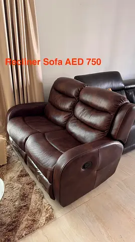 Brown leather 2-seater recliner sofa - good condition, AED 650
