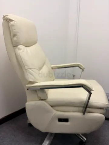 White leather power recliner chair with chrome arms