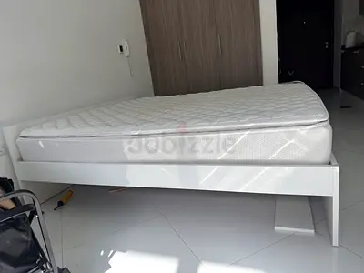 White platform bed frame with mattress - good condition