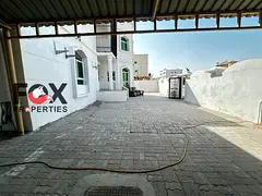 Commercial villa for rent in Al Rawda 1, Ajman. 8 rooms, 4 bathrooms, living room, majlis, shaded ar