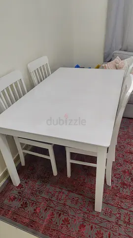 White wooden dining table with 4 chairs - good condition