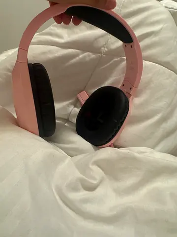Pink over-ear Bluetooth headphones — good working condition