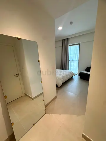 Full-length IKEA Stockholm mirror with modern brass accents