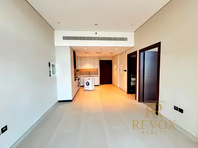 Modern Furnished 1BR | Balcony | Prime Arjan Location