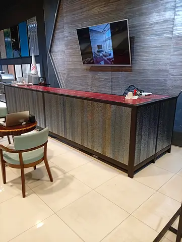 Long decorative sideboard / counter with textured front and red top