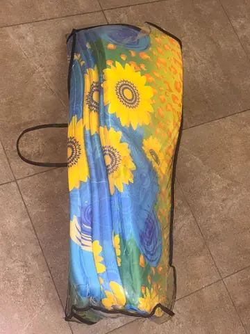 Foldable foam mattress / guest bed with sunflower cover - good condition