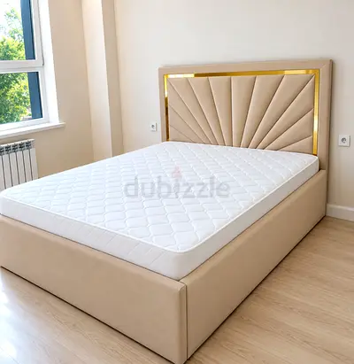 New Beige Upholstered Queen Size Bed with Padded Headboard and Gold Trim