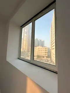 Spacious studio with a beautiful view, semi-separated kitchen, parking and regular maintenance inclu