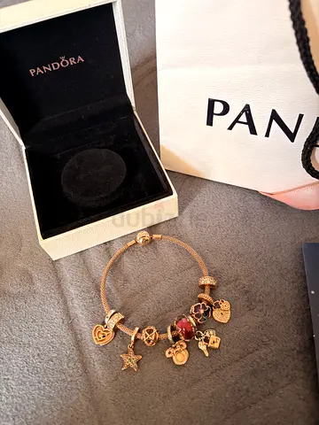 Pandora-style Rose Gold Charm Bracelet with Multiple Charms