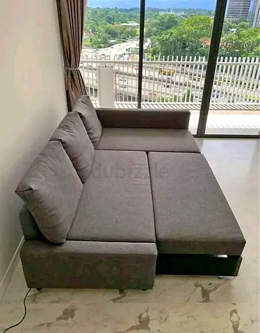 Gray L-shaped Sofa Bed with Storage - Good Condition