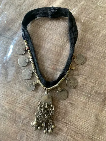 Vintage Afghan-style coin necklace with tassel pendant