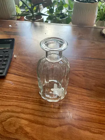 16 Small clear ribbed glass bottle / decorative vase. high 14cm/ wide 7cm