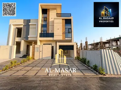 Freehold townhouse in Al Helio 2, featuring two floors and a roof terrace; the price includes registration and ownership fees.