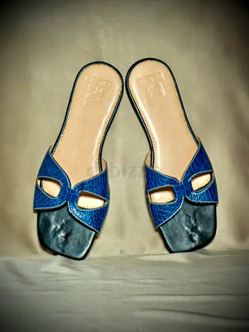 Women's blue slip-on sandals, size unknown, lightly used