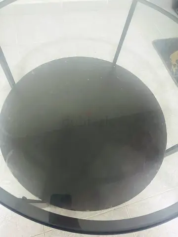 Round glass top side table with metal frame