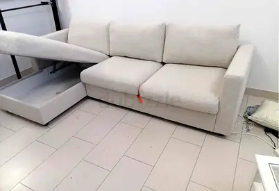 L shape sofa with storage compartment, good condition