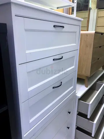 White tall dresser with multiple drawers - good condition