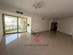 Spacious 2-bedroom + hall apartment for rent in Al Majaz 2. Features include free air conditioning,