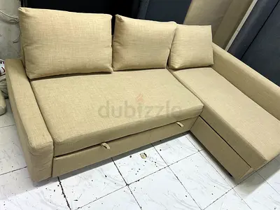 Beige L-shaped Sofa bed with Storage - Good Condition