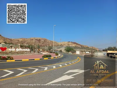 Residential-commercial land for sale in Masfout—second plot from Ghulfa Street—at the lowest price