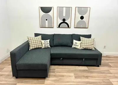 Left-facing grey fabric L-shaped sofa bed with storage - good condition