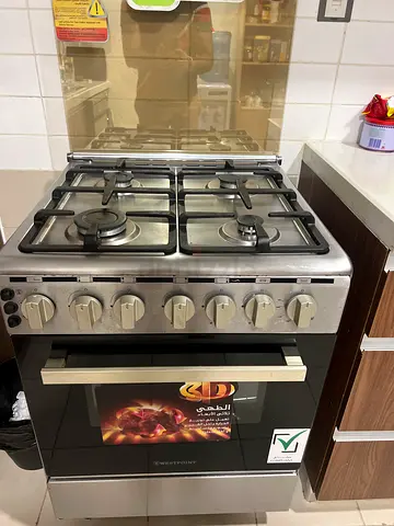Stainless Steel 4-Burner Gas Cooker with Oven - Good Condition