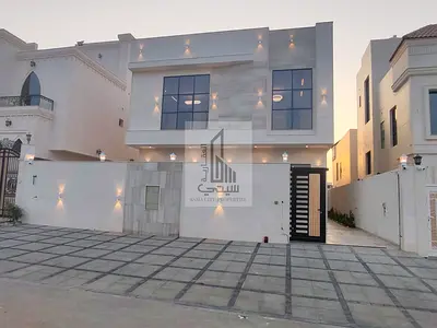 Villa for sale in Al Helio, Ajman | 5 master bedrooms | Private pool | Registration, electricity, and water included.