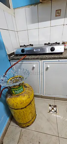 Two-burner gas stove with regulator and cylinder - 150AED