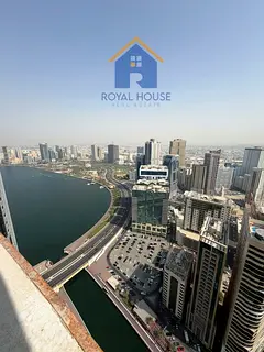 3 bedrooms and a living room in Al Qasba, featurin