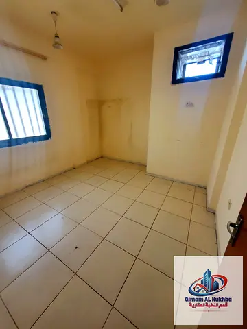Affordable two bedroom apartment in Al Butina with a balcony and a convenient location close to Discount Center and Nesto Market with essential servic