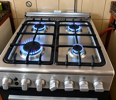 Stainless Steel 4-Burner Gas Cooker with Oven - Good Condition