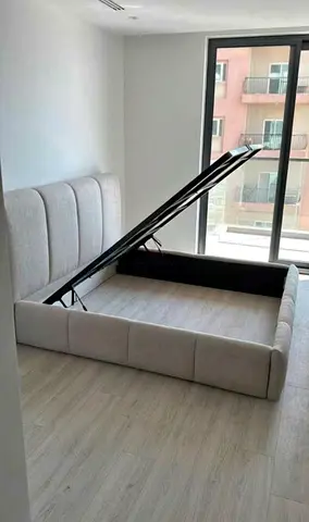 King size fabric storage bed with gas-lift ottoman - light grey