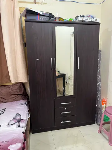Dark wood 3-door wardrobe with mirror and drawers - good condition