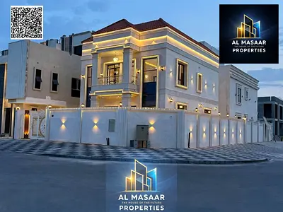 Luxury Corner Villa for Sale in Al Helio 2 – Ajman | Two Floors Plus Roof | Stone Facade | Corner Plot (Two Streets) | Facing Amenities | Registration
