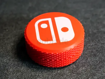 Red & black Nintendo Switch Thumbstick Grip Cap (Single)